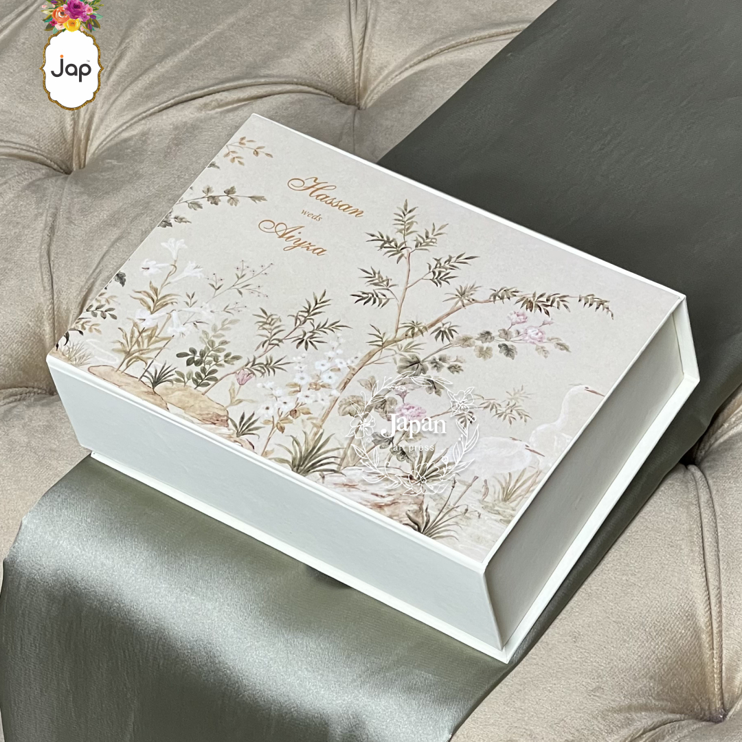 Ivory Botanical Floral Box Wedding Card with delicate wildflower illustrations, sage greenery, and gold lettering.